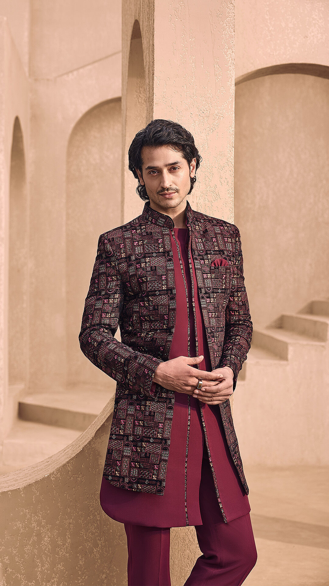 men in brown silk sherwani with pattern on it 